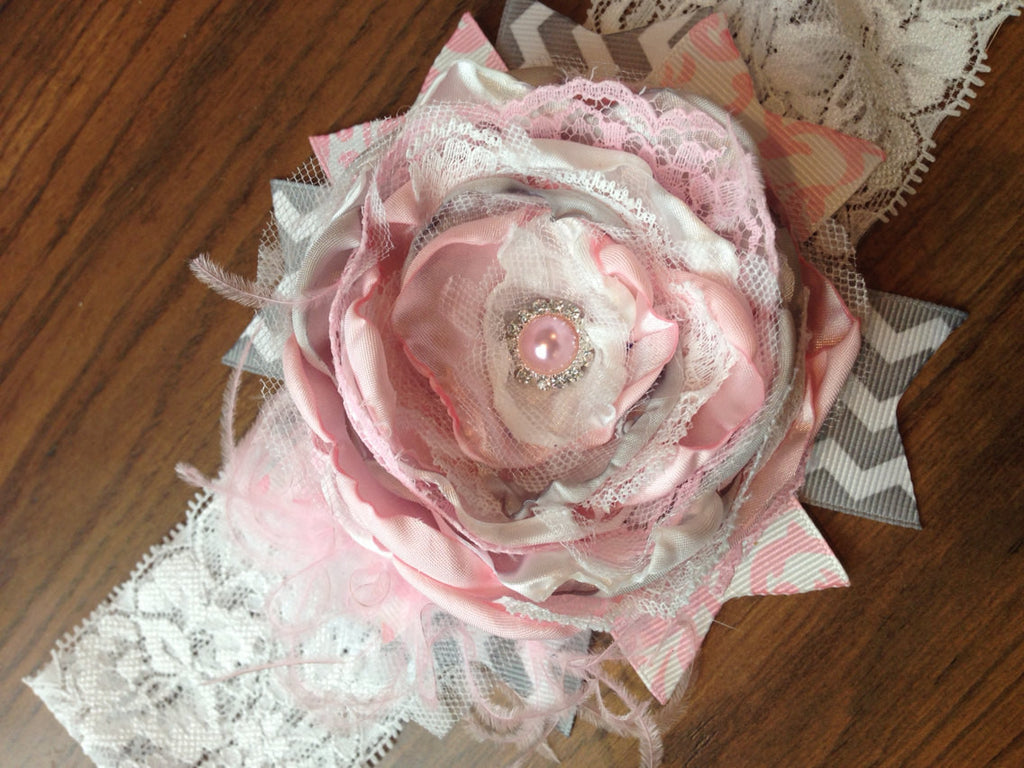 Over the top handmade flower with lace, tulle, satin. Finished with choice of ribbon on a lace headband - Pretty's Bowtique