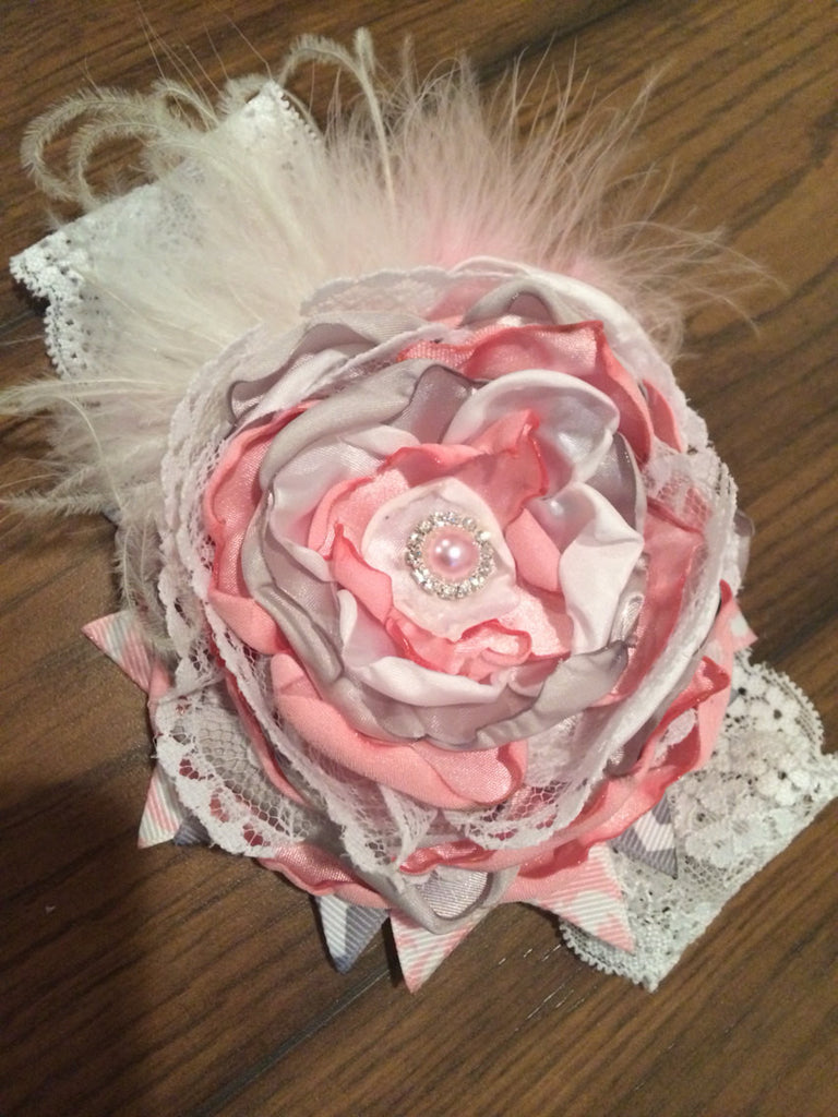 Over the top handmade flower with lace, tulle, satin. Finished with choice of ribbon on a lace headband - Pretty's Bowtique