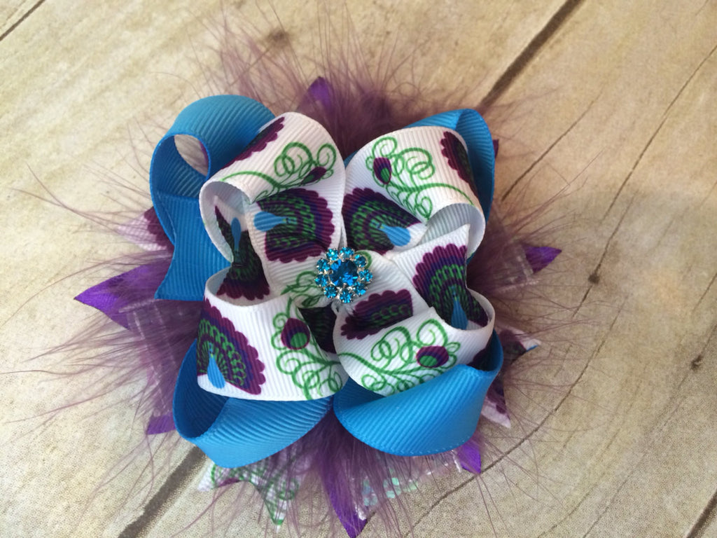 Over the top Peacock feathers, layered ribbon on a clip or headband. - Pretty's Bowtique
