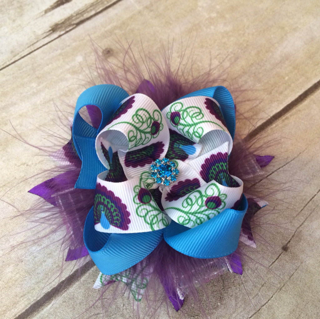Over the top Peacock feathers, layered ribbon on a clip or headband. - Pretty's Bowtique