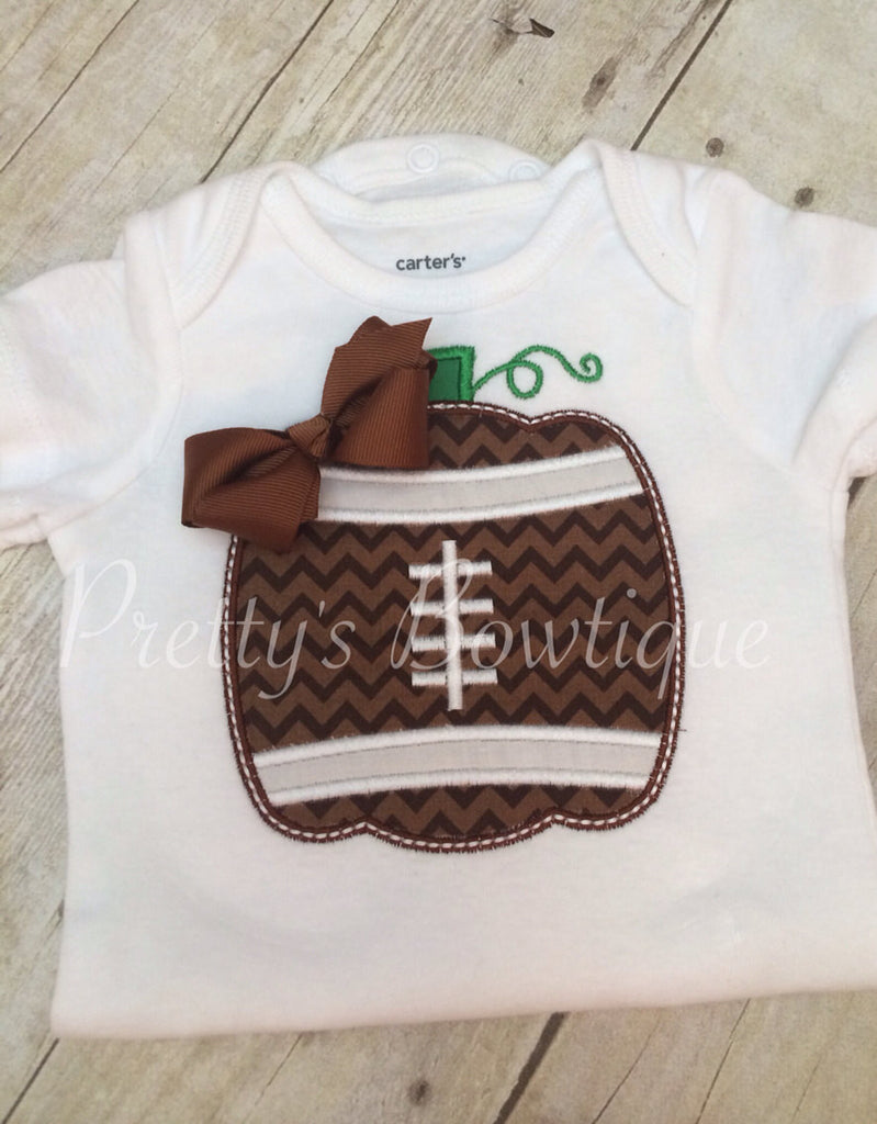 Girls Pumpkin football shirt for babies, toddler, and children.  BOW FOOTBALL PUMPKIN - Pretty's Bowtique