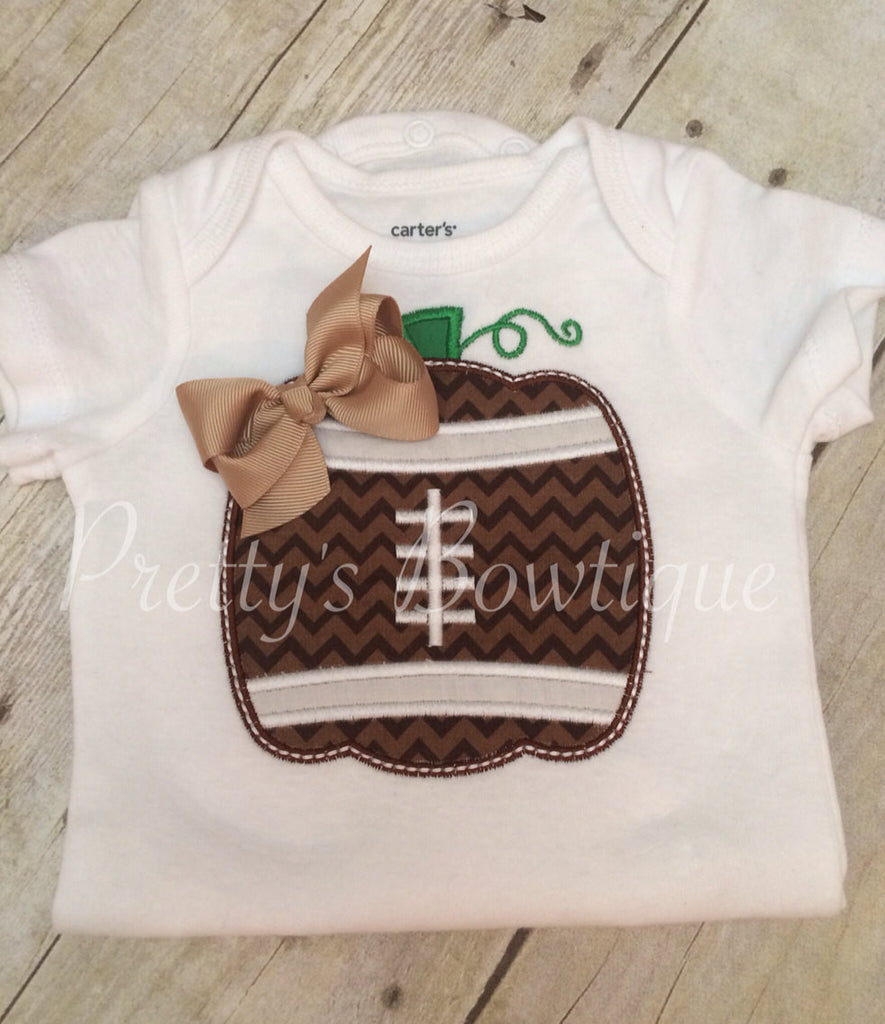 Girls Pumpkin football shirt for babies, toddler, and children.  BOW FOOTBALL PUMPKIN - Pretty's Bowtique