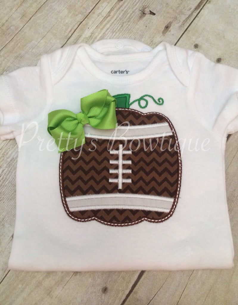Girls Pumpkin football shirt for babies, toddler, and children.  BOW FOOTBALL PUMPKIN - Pretty's Bowtique